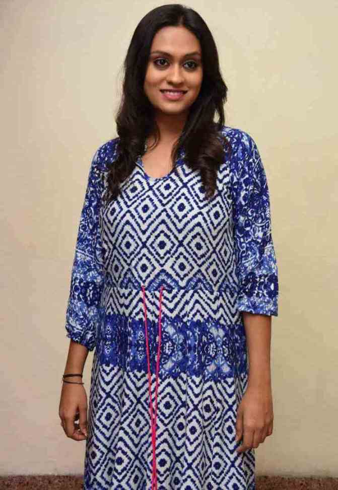 Telugu TV Anchor Geetha Bhagath Stills In Blue Dress