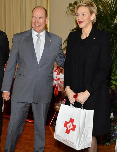 Prince Albert and Princess Charlene distributed gifts to beneficiaries of the Monaco Red Cross on the occasion of the national holiday