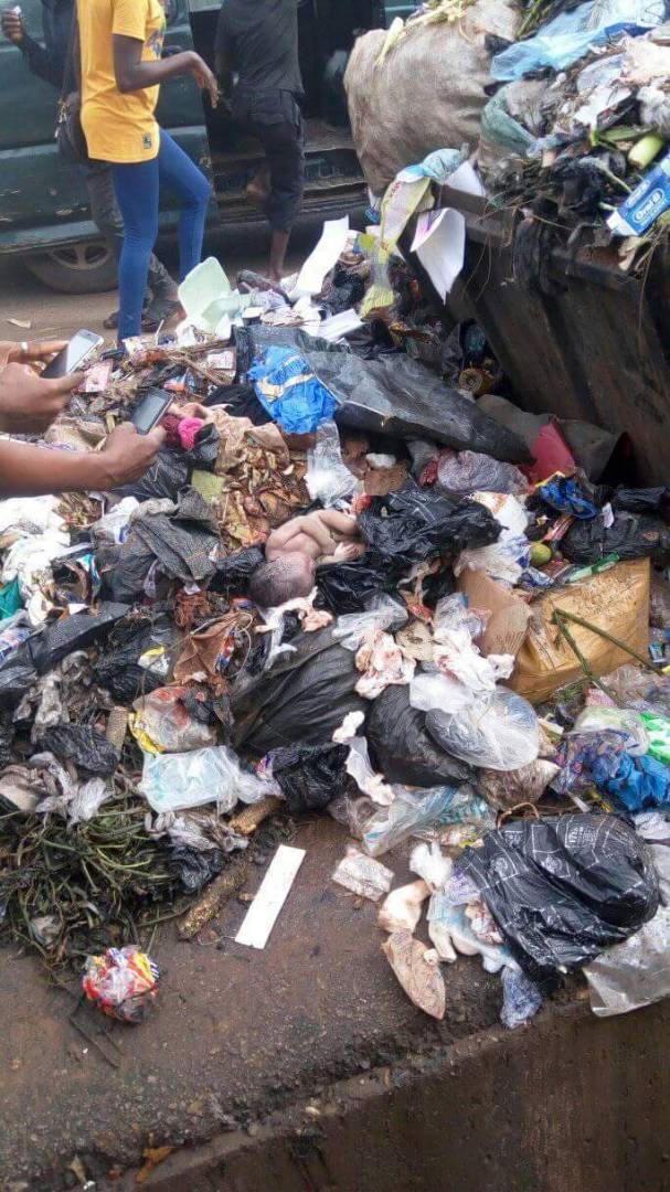 Heartbreaking Photos Of New Born Baby Thrown Into A Garbage Dump By His