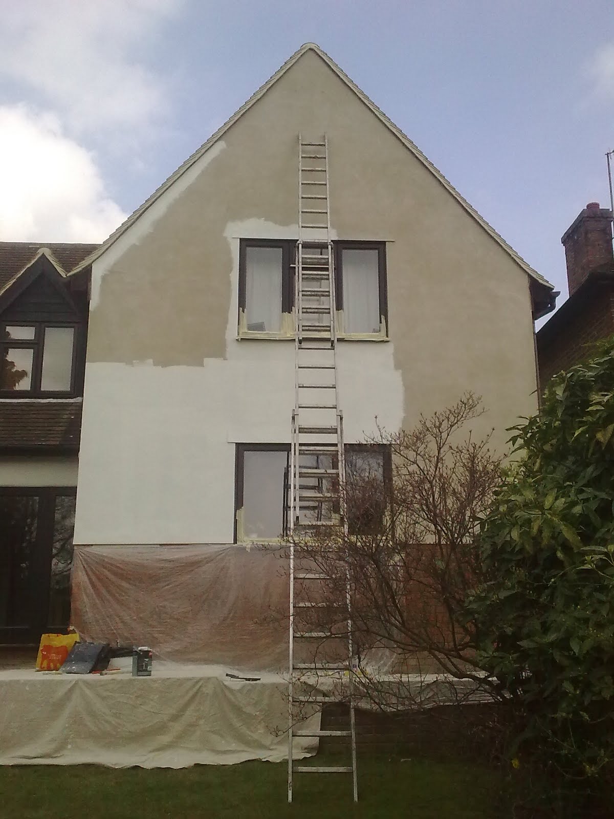 N.W. DECORATING Exterior rendering Johnstone's Pliolite Masonry Paint