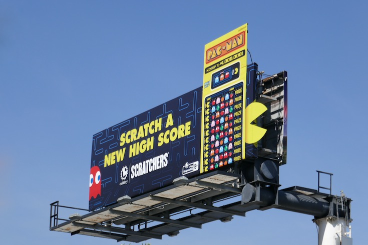 Scratch a new high score California Lottery Pac-Man Scratchers extension billboard Wilshire Boulevard high score California Lottery PacMan Scratchers extension billboard