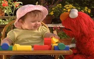 Elmo wants to ask a baby how it builds a tower. Sesame Street Elmo's World Building Things Kids And Baby