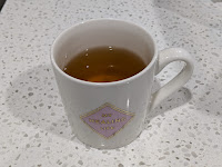 Yellow cow wood tea in mug