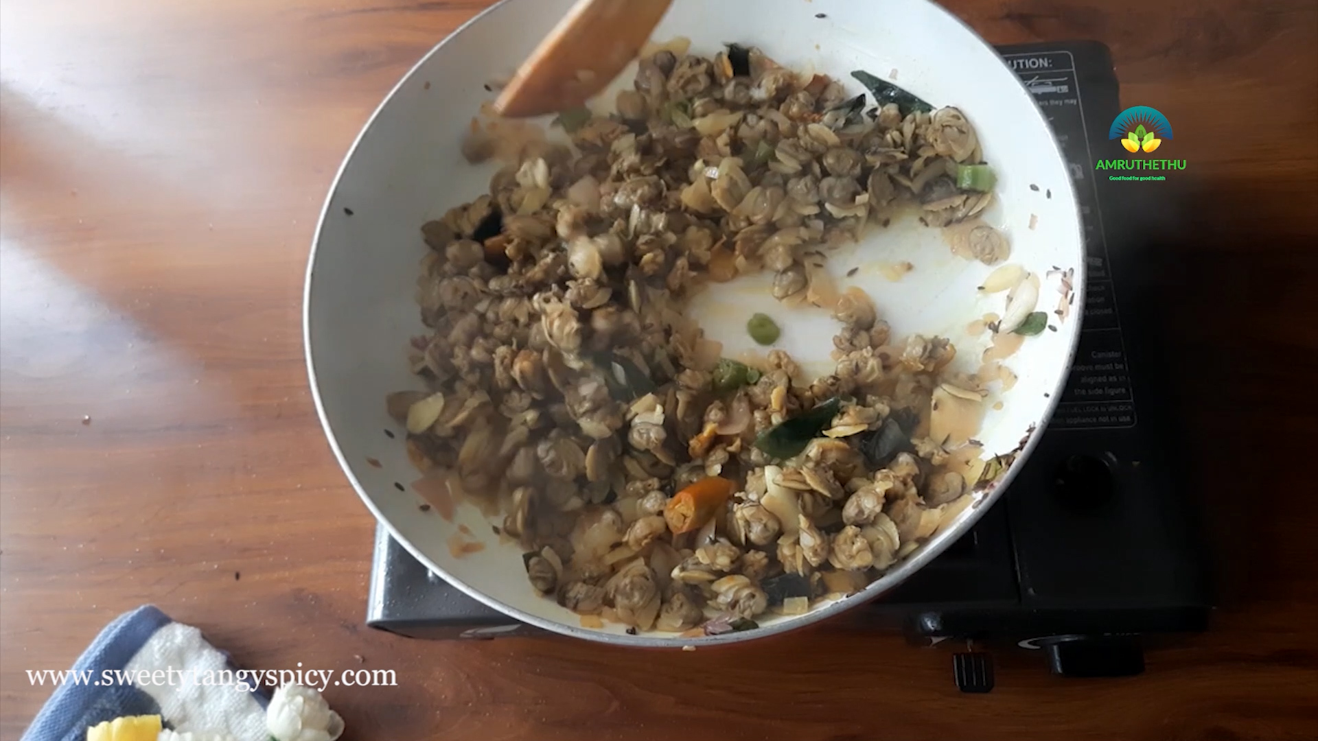 Cook till the clams turns crispy and crunchy. At this stage, the clams