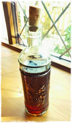 homemade blackberry gin from macerated blackberries