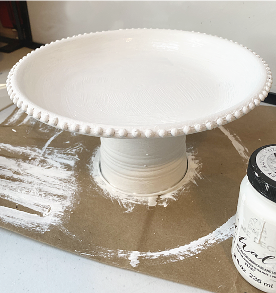 white painted pedestal dish