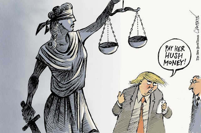 Donald Trump gestures at a statue of Lady Justice while saying to a companion, 