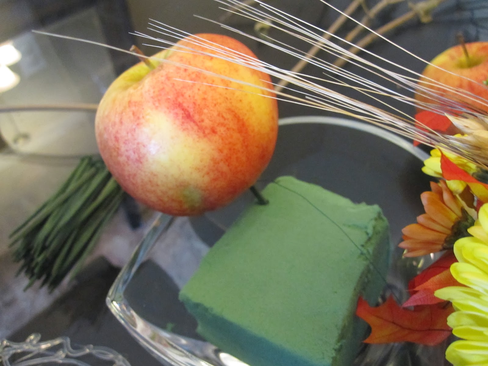 Flowers On The Roof How to Make a Centerpiece using Apples, Spiderwebs and Flowers