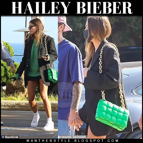 Hailey Bieber in black blazer and green sweater in Malibu on