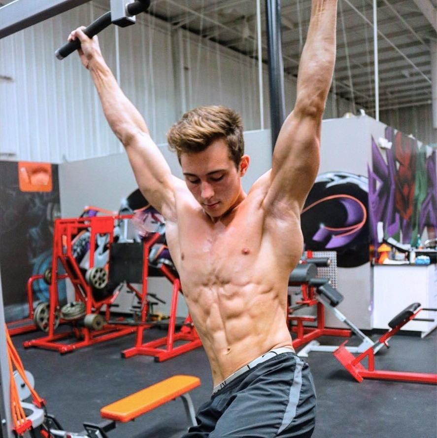 adorable-shirtless-ripped-body-muscle-teen-boy-working-out-arms-gym-abs.