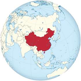 A map of the eastern hemisphere showing China in red at the center.
