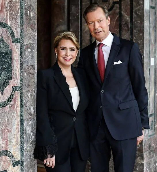 Grand Duchess Maria Teresa wore a new black open sleeves lace trimmet viscose crepe jacket from Alexander McQueen