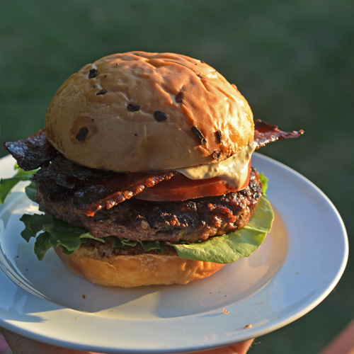 Cheddar burger with brisket jus mayo and candied bacon