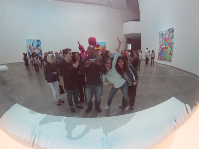 This shot is amazing. Azin and Iuliana are posing, I'm snapping the photo, the lady over my right shoulder works at the museum and is yelling at me in Spanish, while Jon tries to diffuse the situation with her, and Kris is baffled at this lady's aggressive behavior. All in the reflection of a Jeff Koons balloon statue. #nobetterartthanreallife