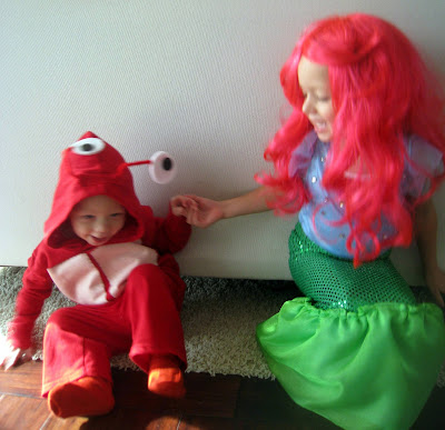 A group of kids in halloween costumes