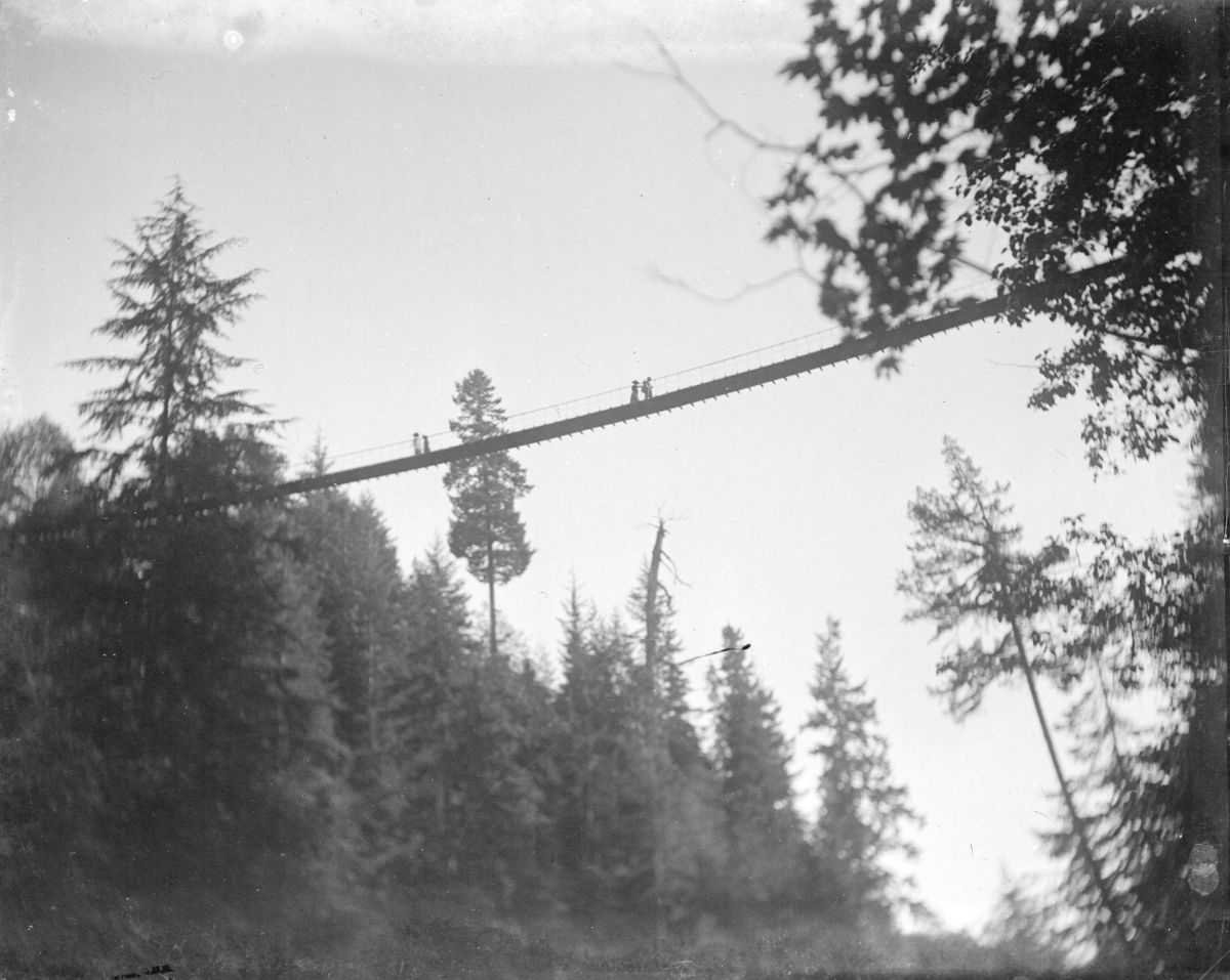 These vintage photographs capture people crossing the famous Capilano Suspension Bridge in Vancouver  1890 1910 - 41
