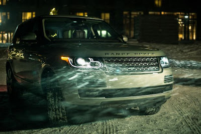 The Next Generation Range Rover casts a magic glow on snowy streets.