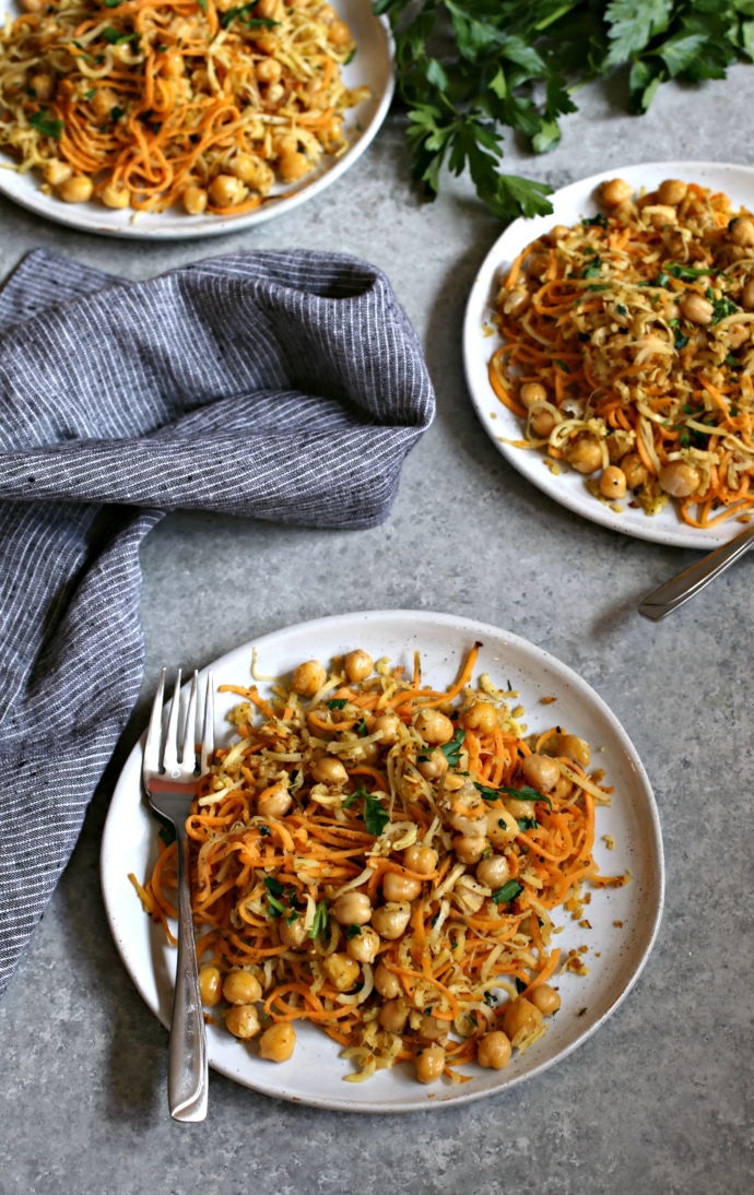 Recipe for spiralized sweet potatoes and parsnips with chickpeas and a crispy breadcrumb topping.