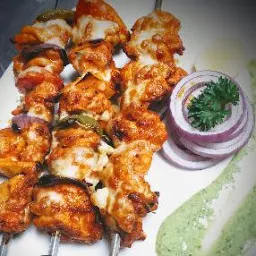 Serving Chicken kebab with green chutney, onion slices for chicken kebab recipe