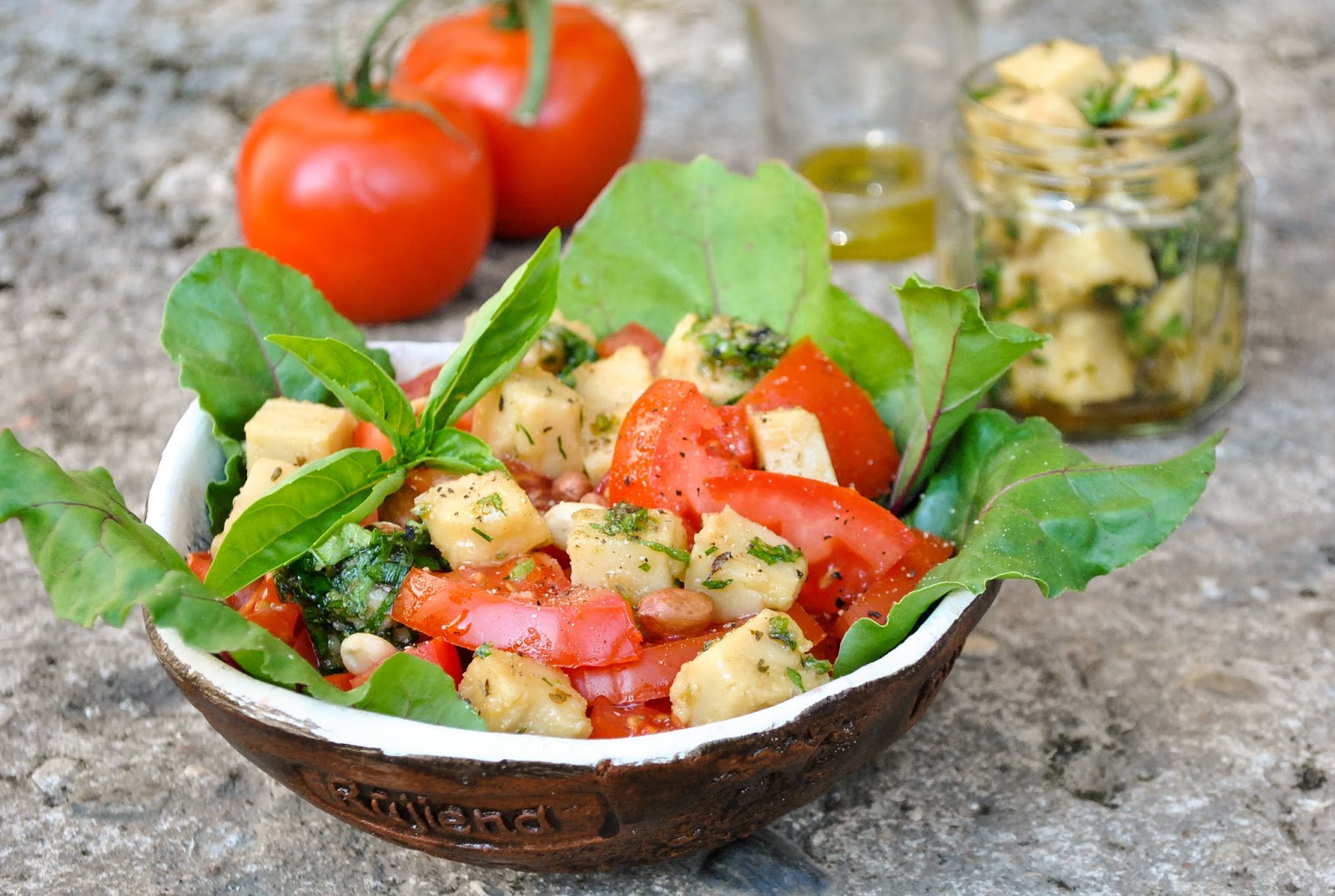 Homemade vegan cheese cubes in a herb marinade VeganSandra