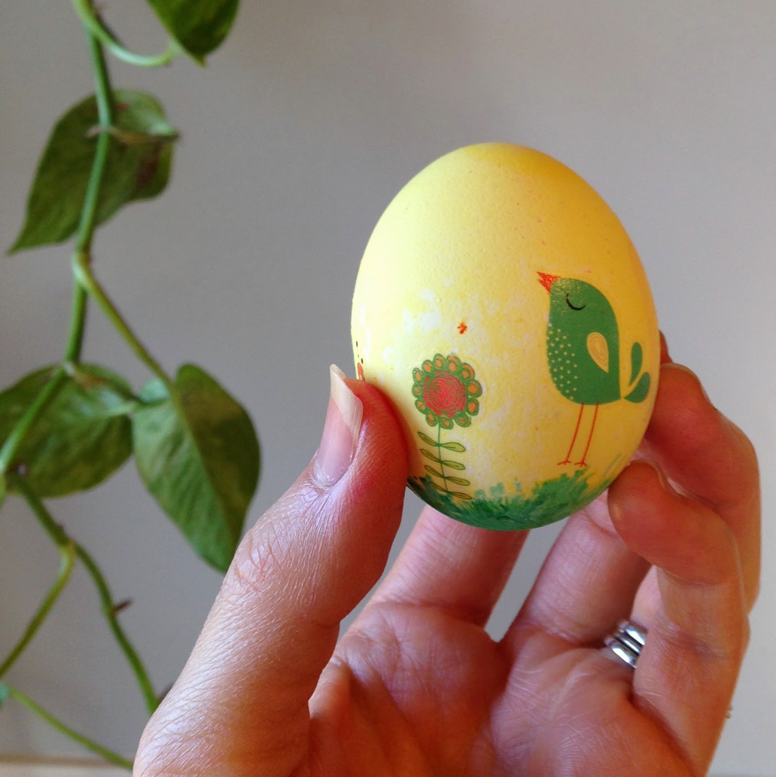 Decorating Easter eggs with temporary tattoos