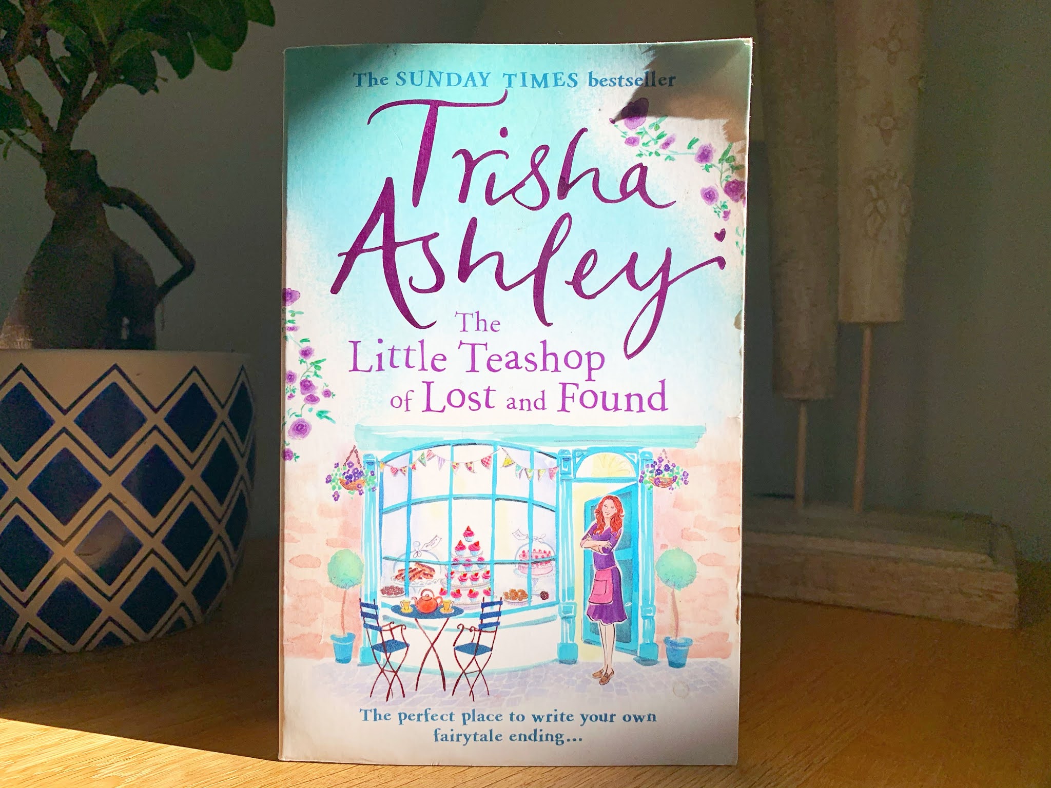 The Little Teashop of Lost and Found by Trisha Ashley The Little Teashop of Lost and Found by Trisha Ashley on a shelf