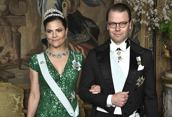 Crown Princess Victoria wore Green gown and Anya Hindmarch Gold Metallic Clutch Princess Sofia wore red gown and  silver diamond Metallic Clutch, diamond tiara.