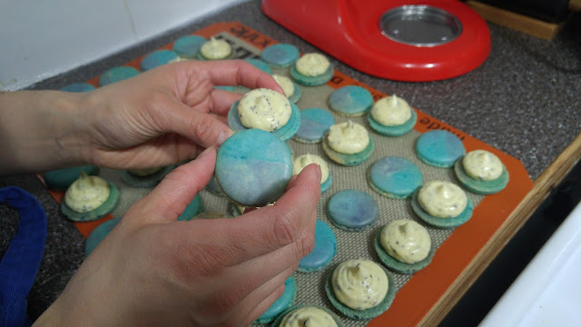 assembling the earl grey macarons