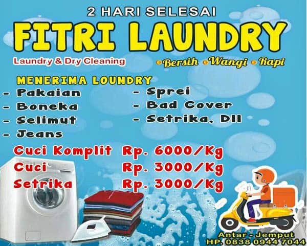 desain spanduk usaha laundry