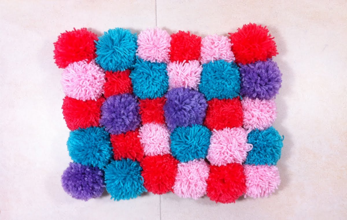 Tapete hecho con pompones de lana - Manualidades Faciles - Todo sobre