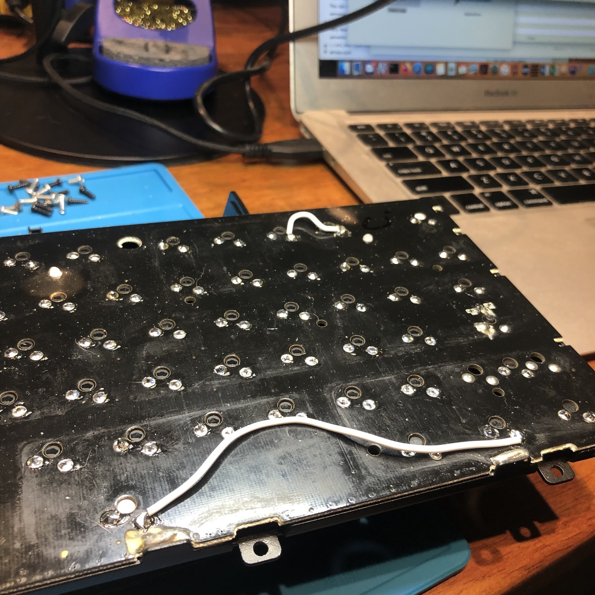 Screwing up, and fixing it (bridge fix for a lifted pad, soldering a mechanical keyboard)