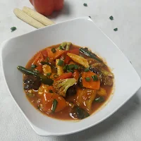Serving exotic vegetables in hot garlic sauce