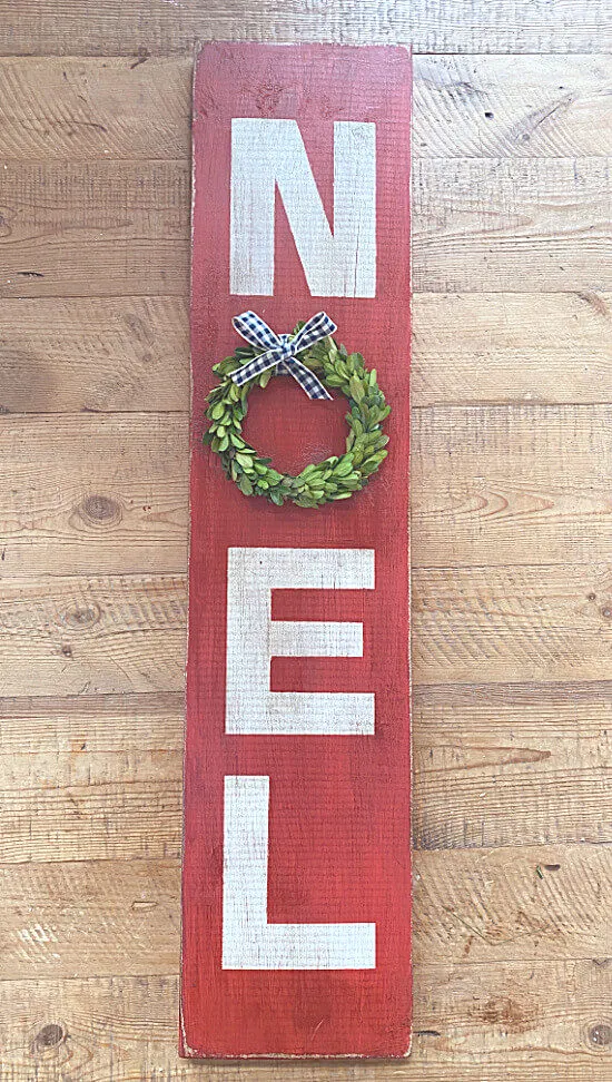 Noel sign with a wreath