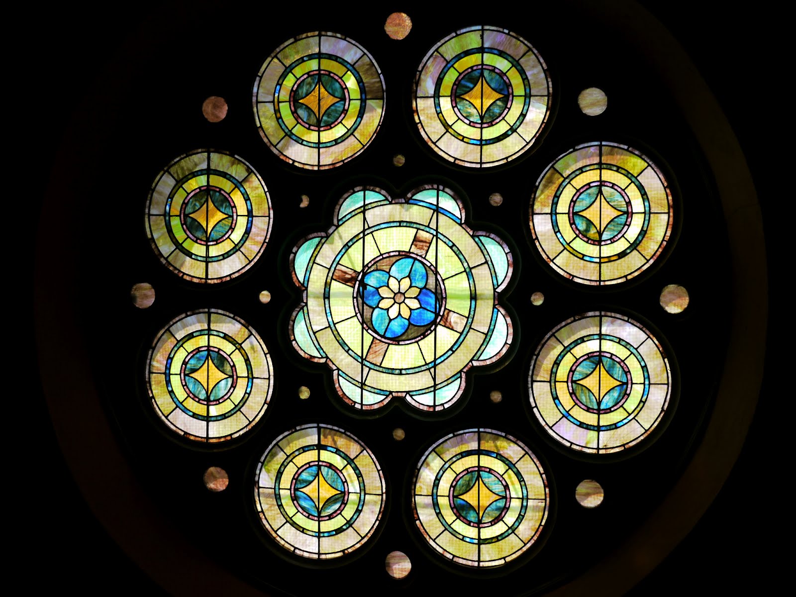 Stained-glass window at the front of the church