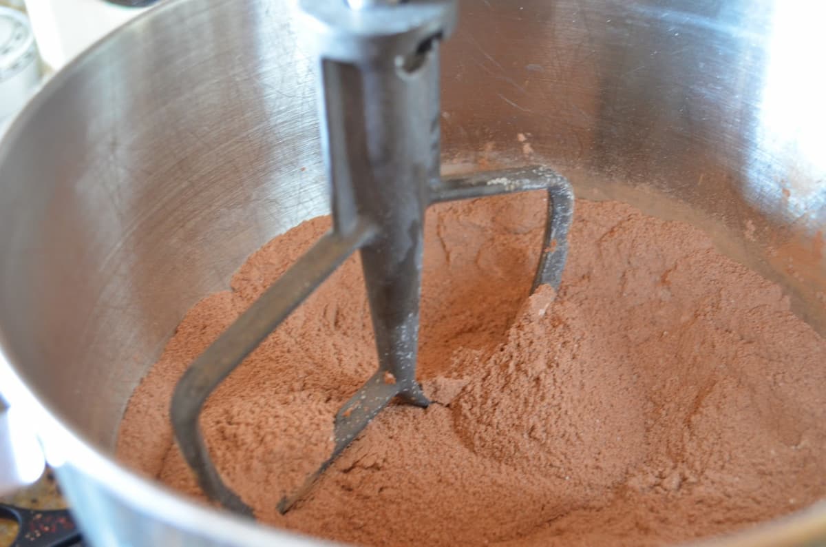 From scratch Chocolate Cake mix being mixed together in a mixing bowl.