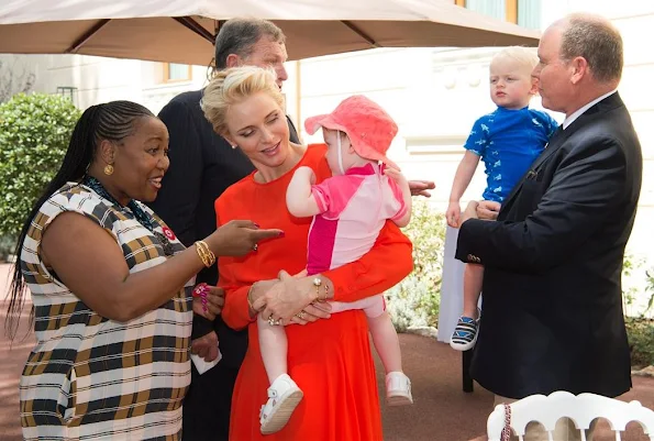 Prince Albert, Princess Charlene, Prince Jacques, Princess Gabriella of Monaco. Princess Charlene Armani Prive Dress, Jeweler diamond earrings, style royal fashions, newmyroyals