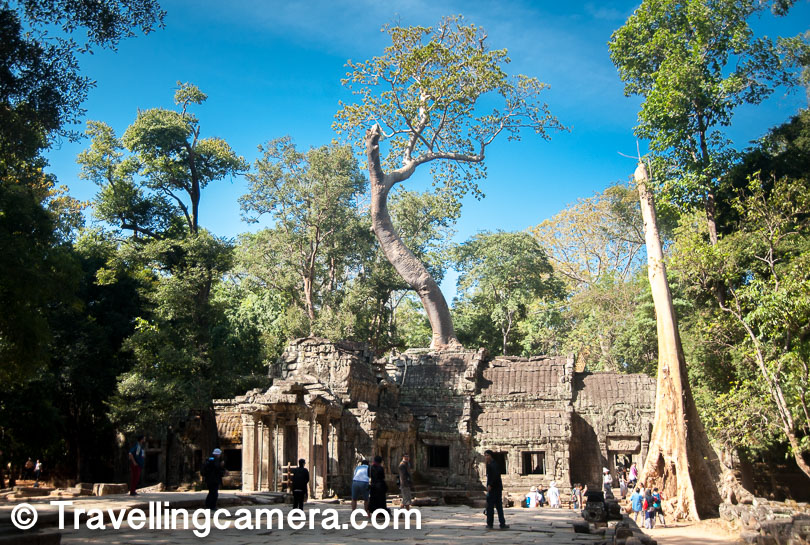 Lot of people get stuck at this place. Some are interested in getting clicked with this structure, while others start appreciating the nature power. And this is just the beginning of the beautiful temple Ta Prohm in Angkor Wat heritage site. There is an interesting thing about these temples that local authorities have built wooden platforms at appropriate areas which are more photo friendly. You would always find these places busy with queue of people. We didn't need any defined places to click the photographs so We moved on :)