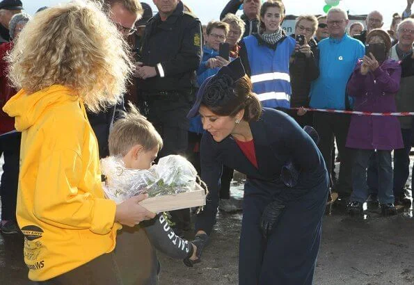 Crown Princess Mary officially opened Crown Princess Mary's Bridge in Roskilde.She is wearing blue coat and dolce Gabbana dress