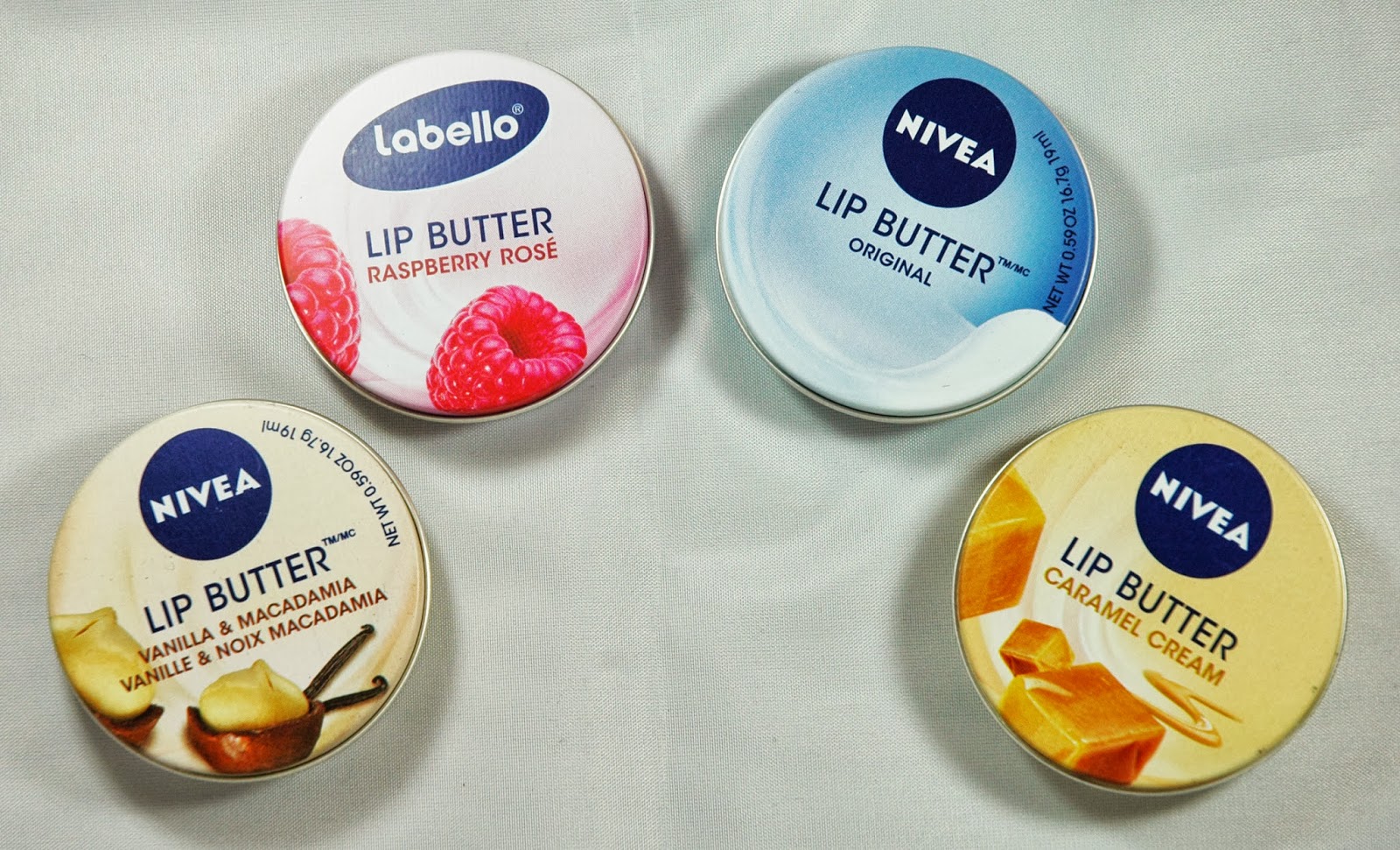 Масло для губ зачем. Масло для губ нивея Lip Butter. Nivea для губ. Бальзам для губ нивея. Labello масло для губ.