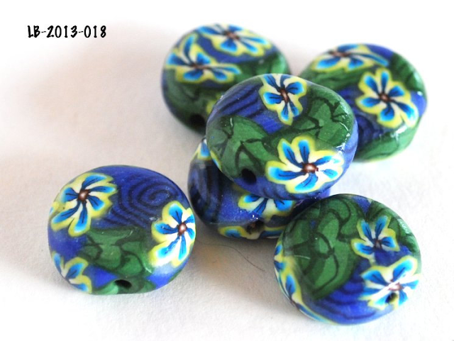 https://www.etsy.com/listing/128596680/yellow-and-blue-flower-beads-with-navy?ref=tre-2724573252-9