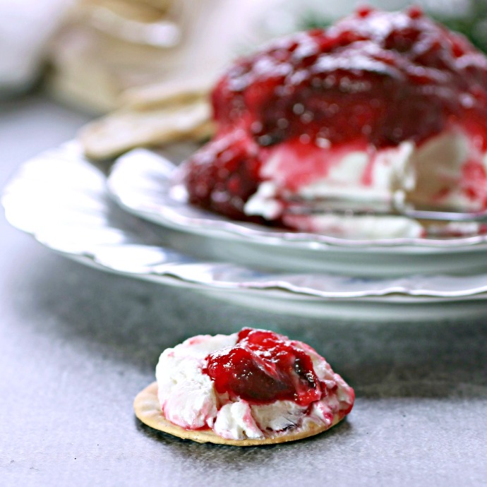 Recipe for a tangy Greek yogurt and cream cheese appetizer served with a cranberry and apple compote.