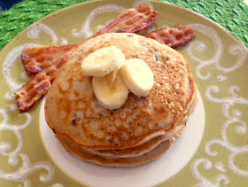 Banana Walnut Pancakes: Light fluffy steaming hot pancakes laced with bananas and walnuts are doused in warm maple syrup. - Slice of Southern