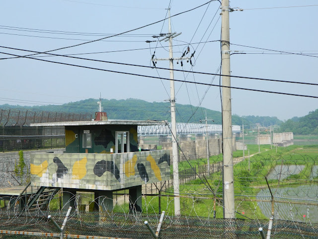 Check posts with barbed wire fence