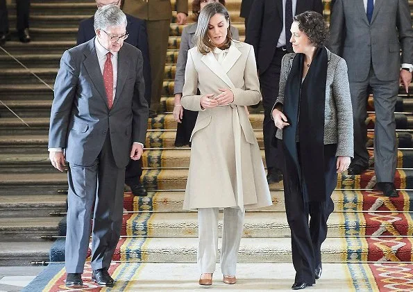 Queen Letizia carried Carolina Herrera Authenticity Card Camelot Collection Handbag and she wore Carolina Herrera wool and cashmere coat