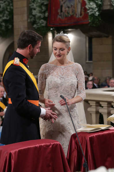 Princess Stephanie of Luxembourg and Crown Prince Guillaume of Luxembourg are seen exchanging rings during their wedding ceremony at the Cathedral of our Lady of Luxembourg