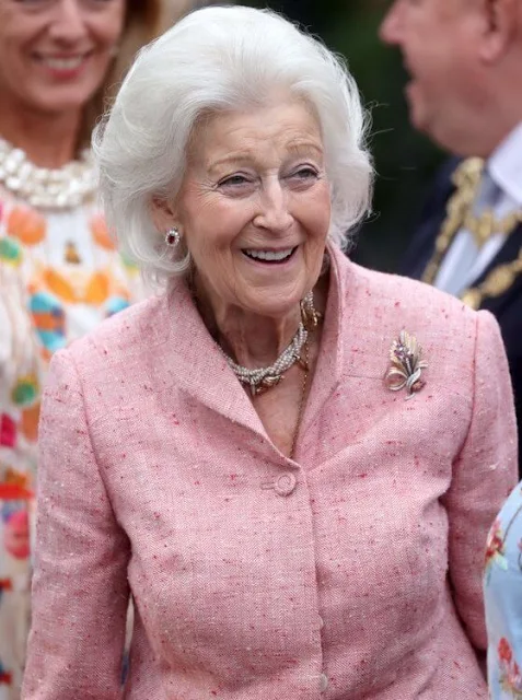 The Countess of Wessex wore a new blouson sleeve knit midi dress from Victoria Beckham. Princess Anne and Princess Alexandra