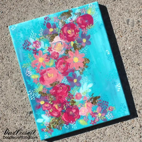 Make a layered piece of art with layers of flowers, textures and sparkle. This painting is canvas with multiple layers of thick, creamy paints and 2 layers of Envirotex Lite High Gloss Resin. There are a variety of textures, shines, depths and finishes on this painting that makes it so intriguing.