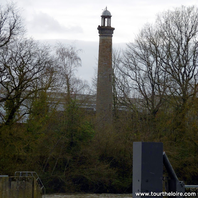 Mysterious tower opposite paper mill, Buxeuil.  Indre et Loire, France. Photographed by Susan Walter. Tour the Loire Valley with a classic car and a private guide.