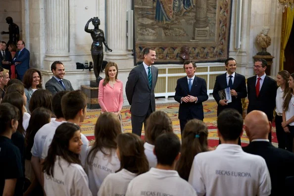 Queen Letizia wore Hugo Boss skirt and blouse