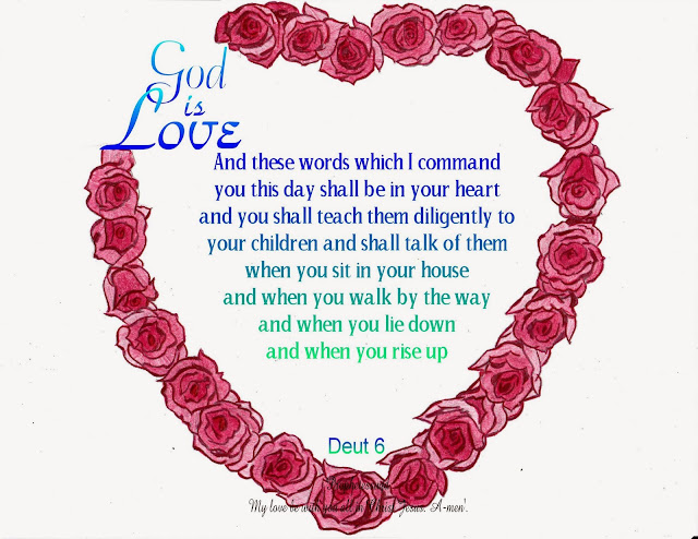 heart made of red roses with God is Love written in blue scripture in center